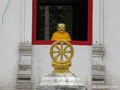 Wat Phra That Doi Tung Mae Sai gold statue
