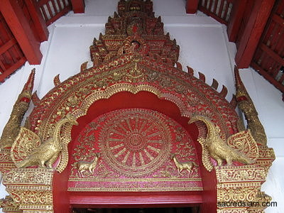 Wat Phuak Hong Chiang Mai gilded door pediment